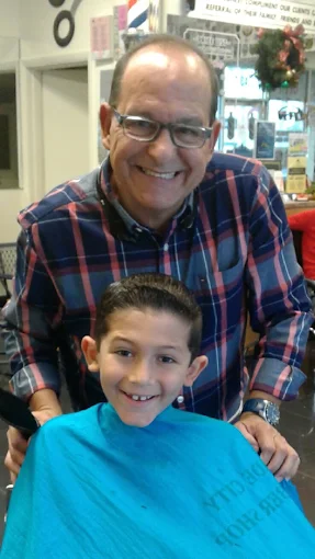 Barber Ron with happy client in Fade City shop